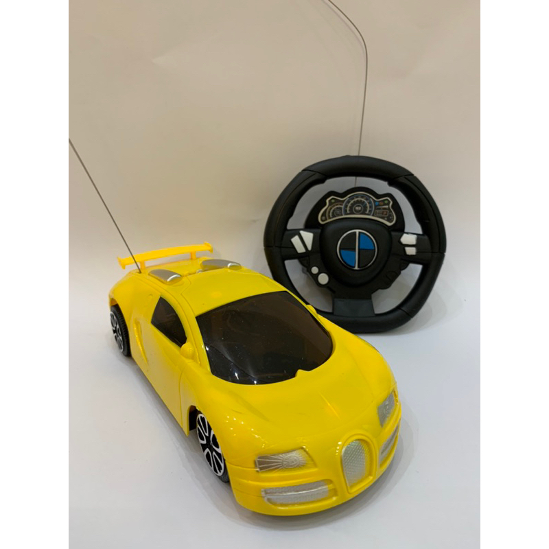 Carro de Controle Remoto Volante Amarelo Carrinho de controle remoto Com Luzes - Brinquedo - Promoçao – foto na Shopee Brasil
